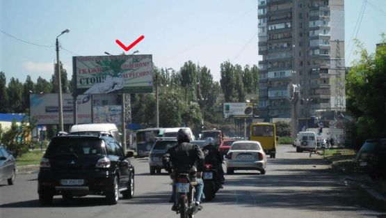 Фото рекламной плоскости по адресу Победы пл. / ул.Космонавтов, 74