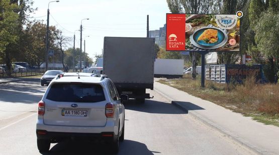 Фото рекламной плоскости по адресу Отрадный пр., возле жд моста, к Якутской ул.