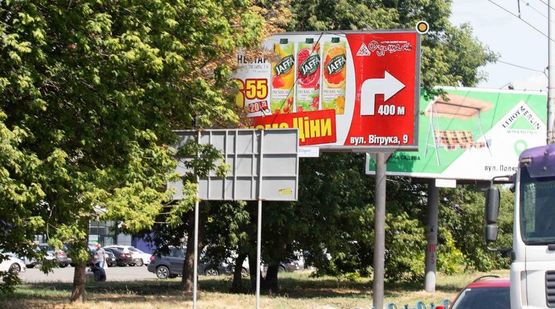 Фото рекламной плоскости по адресу Полярная ул.,8, перед поворотом на Калнышевского ул