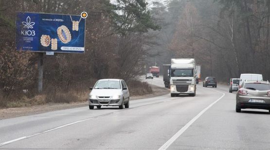 Фото рекламної площини за адресою Гостомельское шоссе, перед КПП, перед АЗС "ОККО", слева