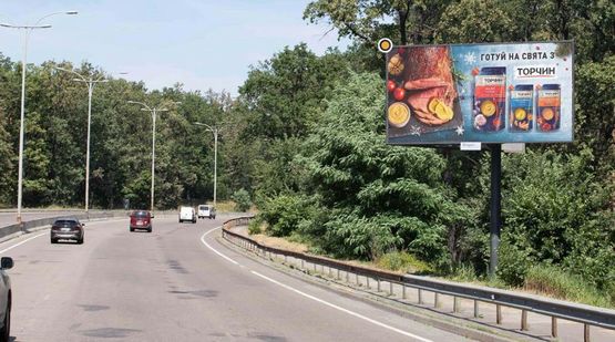 Фото рекламной плоскости по адресу Большая Кольцевая дорога, 300м к загородному комплексу "Колыба Хаус"