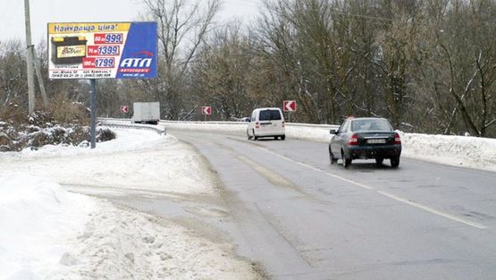 Фото рекламной плоскости по адресу Мира просп., Киевское шоссе, за заводом “Силикат“, на развилке