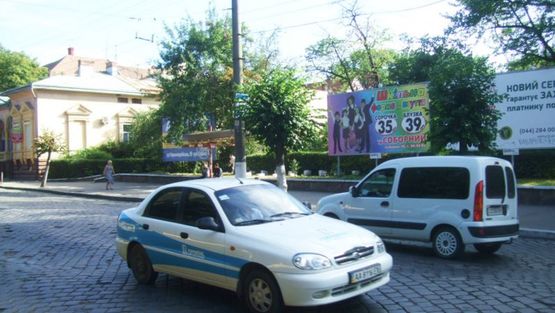 Фото рекламной плоскости по адресу Главная ул, 135, из центра