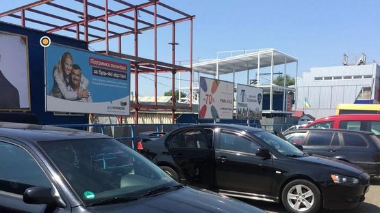 Фото рекламной плоскости по адресу Калиновская ул, 2 слева, в центр