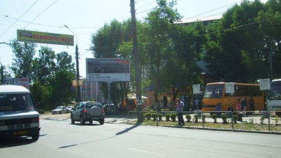 Фото рекламной плоскости по адресу Московской Олимпиады ул / Фастовская ул, выезд из города