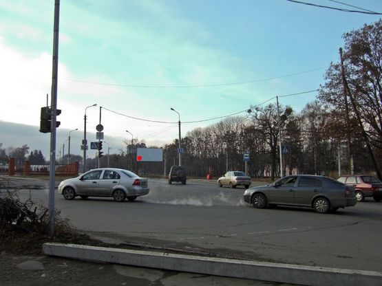 Фото рекламной плоскости по адресу перехрестя вул.Толстого - вул.І.Франка (зупинка). неподалік: зупинка, центр міста (в центр)