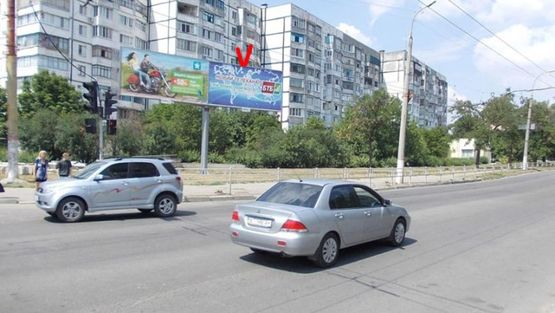 Фото рекламної площини за адресою Люксембург Р ул / Комкова ул, правый