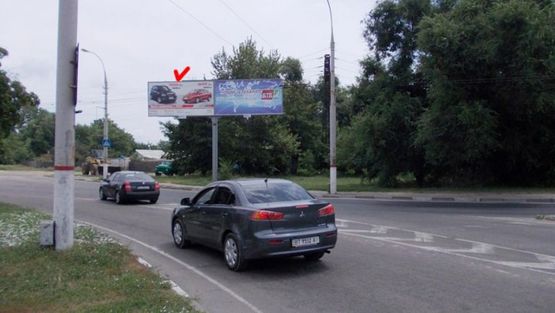 Фото рекламної площини за адресою Паровозная ул, на пл 200 лет Херсона, левый