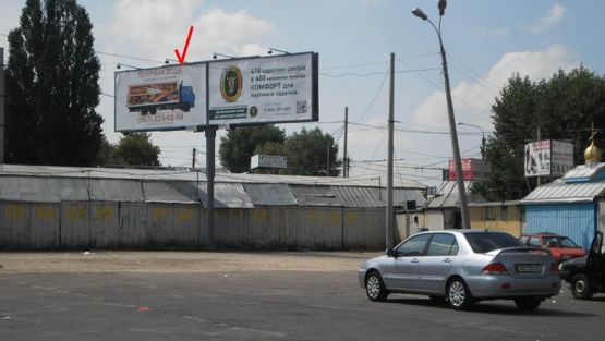 Фото рекламної площини за адресою Львовское шоссе, рынок Изида, въезд со Львова,  Тернополя параллельно, на остановку, левый
