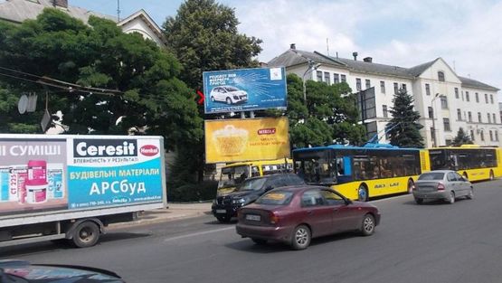 Фото рекламной плоскости по адресу Привокзальная пл,  перед Вокзалом, на ул Вовчинецкую верхний