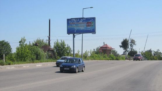 Фото рекламной плоскости по адресу Надричная ул, за ж/д переездом, к переезду