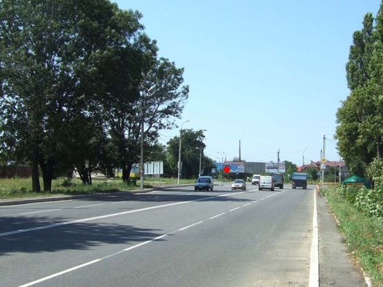 Фото рекламної площини за адресою Т-подібне перехрестя Вінницьке шосе - вул.Профспілкова. неподалік: оптові бази буд матеріалів, побутової хімії, садівництва (в'їзд в місто, в центр) [ліве вухо]