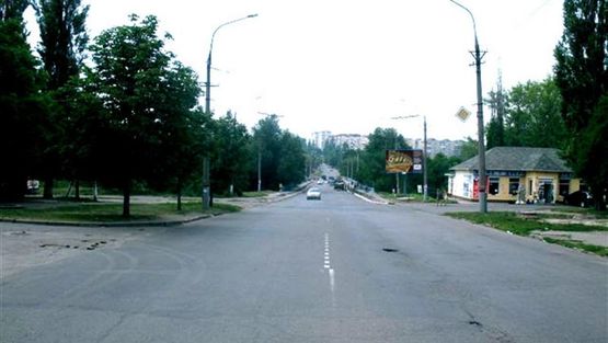 Фото рекламной плоскости по адресу КРЭСовская ул, мост через реку Саксагань, к центру