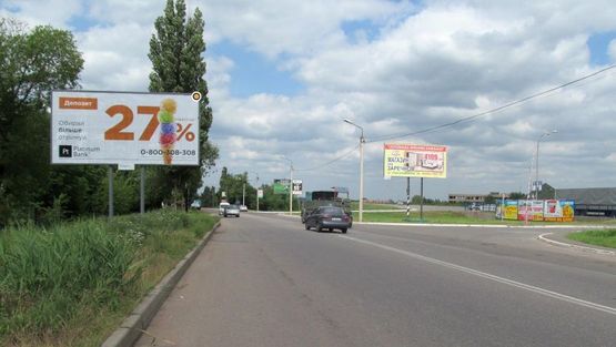 Фото рекламной плоскости по адресу Быкова ул, напротив выезда из Эпицентра