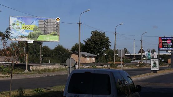 Фото рекламной плоскости по адресу Карпенка-Карого ул. / Сухомлинская ул., СТО Пежо, в центр