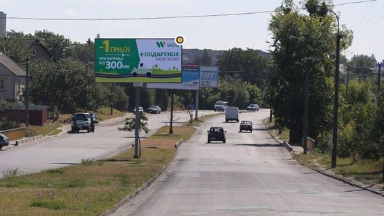 Фото рекламної площини за адресою Карпенка-Карого ул., разделитель, насосн станция, из центра