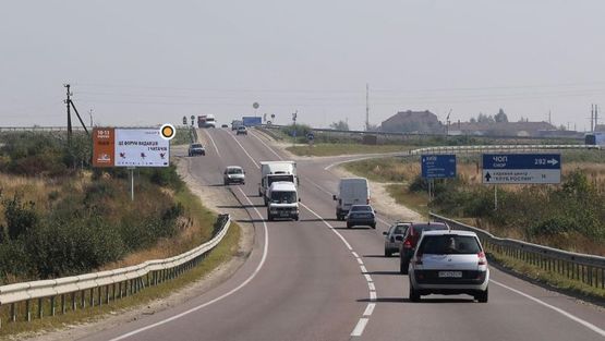 Фото рекламной плоскости по адресу Кольцевая дорога, поворот на ТЦ КИНГ КРОСС