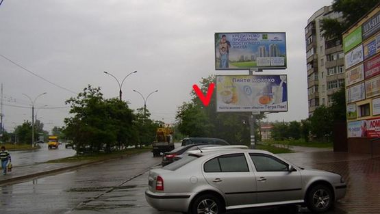 Фото рекламной плоскости по адресу Лушпы М пр, нижний, из центра