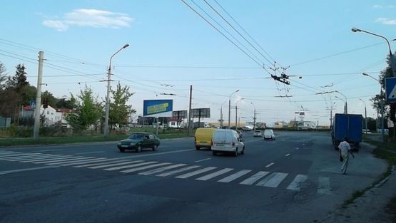 Фото рекламної площини за адресою 15-го Квитня ул. / Бандеры С. ул., из центра