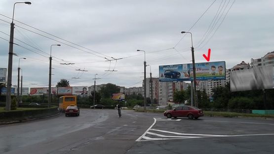 Фото рекламной плоскости по адресу Коновальца ул / Злуки ул, правый, из центра