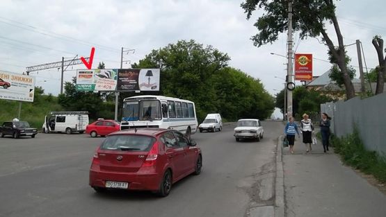 Фото рекламной плоскости по адресу Бродивская ул., возле 2-го транспортного туннеля левый, из центра