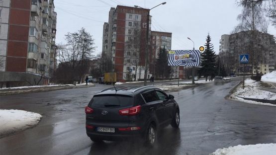 Фото рекламной плоскости по адресу Коновальца ул.15, разделитель