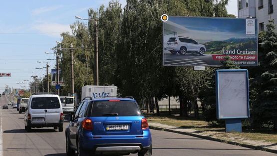 Фото рекламной плоскости по адресу Киевская ул, 112, из центра