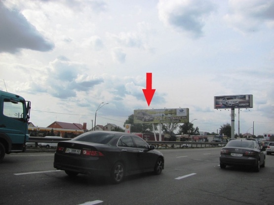 Фото рекламної площини за адресою Кольцевая дорога (разделитель, в направлении Победы просп.) напротив ул.Зодчих, 32