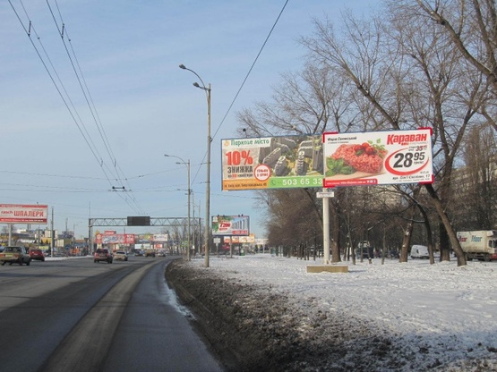 Фото рекламної площини за адресою Кольцевая дорога, ул. Зодчих, 62 (УкрСибБане, АЗС "УкрАВТО", в направ. прос. Победы), правый