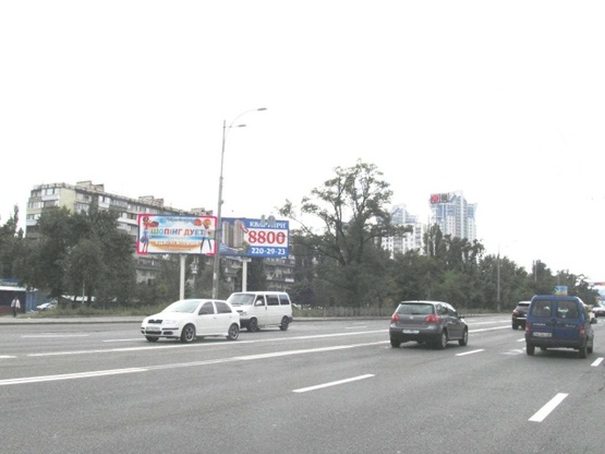 Фото рекламной плоскости по адресу Воссоединения просп. (ул. Серафимовича, 9), вещевой рынок, маг. "Мобидик"
