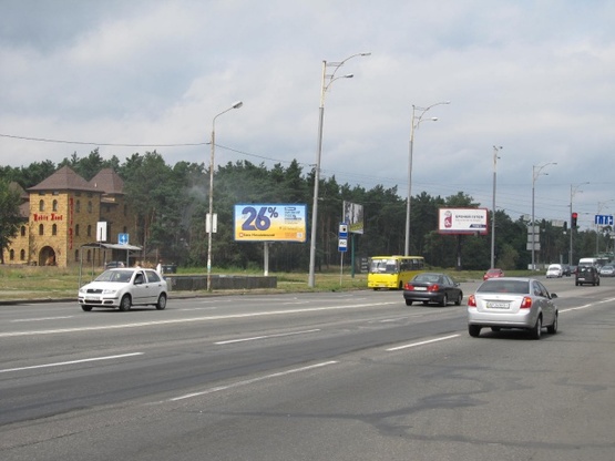 Фото рекламной плоскости по адресу Братиславская ул. - просп. Лесной (АЗС "ТНК", в направлении просп. Ватутина Ген.)