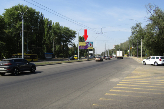 Фото рекламной плоскости по адресу Заболотного ул., 156/1,на разделителе (АЗС "КЛО",супермаркет "Пчелка"), в направл.метро Теремки