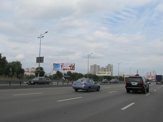 Фото рекламной плоскости по адресу Бажана Н. просп., 600м до ст. м.  "Харьковская" (ТЦ "Пирамида, АЗС "Золотой гепард", направление в Борисполь)