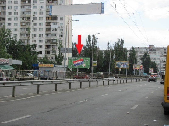 Фото рекламной плоскости по адресу Малиновского ул. - Оболонский просп. (ст. м.  Оболонь, супер-маркет "Велика кишеня", семейный центр "Дивосвіт", направление Дружбы народов пл.)