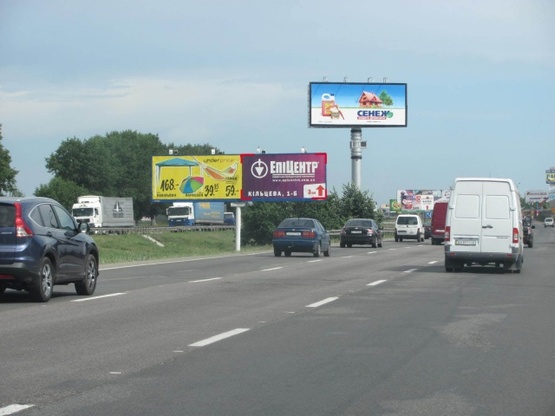 Фото рекламной плоскости по адресу Кольцевая дорога, напротив супермаркета Край (на разделительной полосе, автосалон Great Wall, автосалон "Subaru", в направлении просп. Глушкова Ак.)