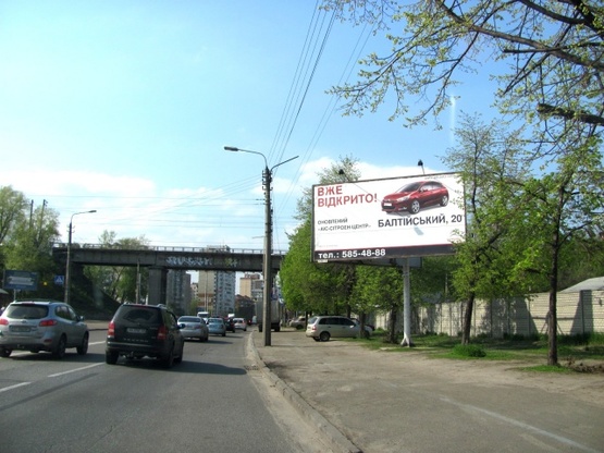 Фото рекламной плоскости по адресу Скляренко ул./ ул.Добрынинская, (напротив "птичьего" рынка, автосалон "Honda", "Citroen", АЗС "КЛО", направ. в центр города)