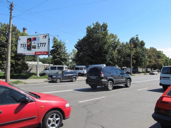 Фото рекламной плоскости по адресу Скляренко ул./ ул.Добрынинская, напротив "птичьего" рынка