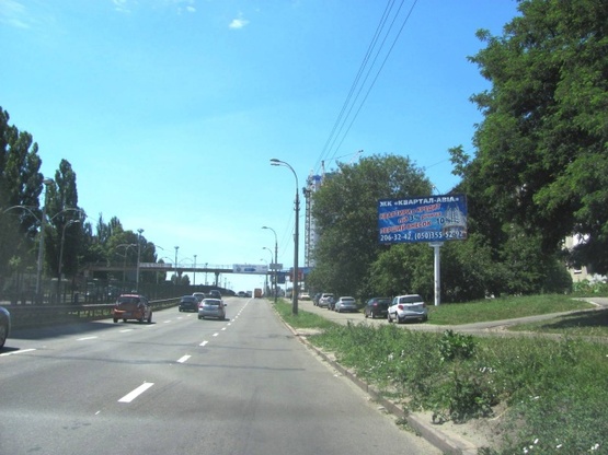 Фото рекламної площини за адресою Комарова просп.,14-16 (в направлении Борщаговки, Авиационный университет, по маршруту скоростного трамвая)