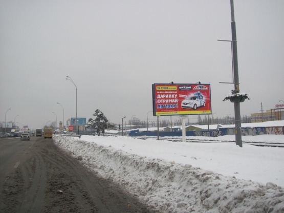 Фото рекламной плоскости по адресу Броварской просп., эл. опора №118, ст. м.  Лесная (парк Киото, выезд из города)