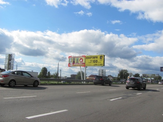 Фото рекламної площини за адресою Кольцевая дорога в районе ул. Зодчих, 30, (на разделительной полосе, АЗС "Shell"), по направлению Победы просп.