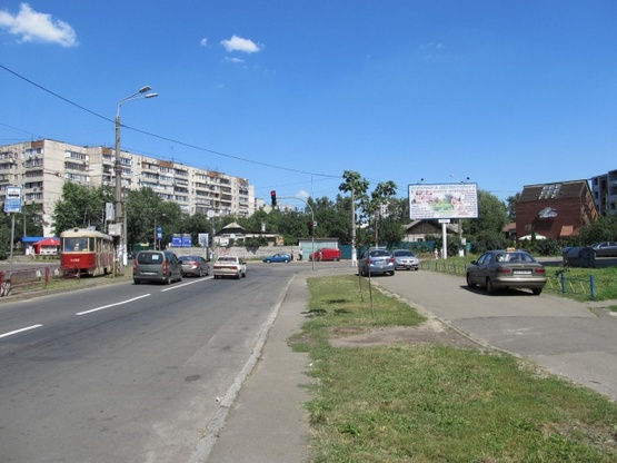 Фото рекламної площини за адресою Тростянецкая ул., 12 (ресторан "Кабачек на бочек"), сьезд с Тростянецкая ул. на ул. Славгородскую