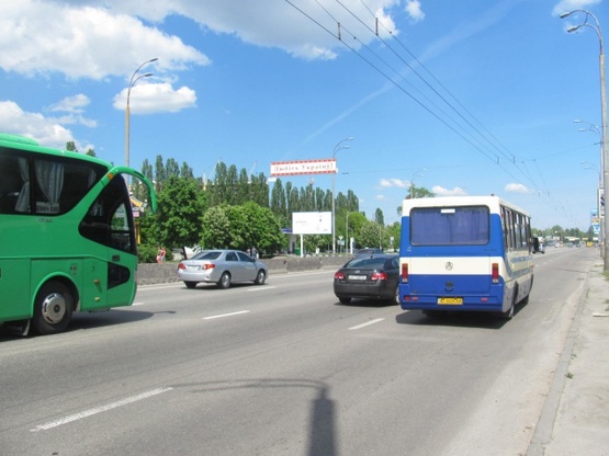 Фото рекламной плоскости по адресу Глушкова Ак. просп., 10, (ст м. Иподром, дельфинарий "Немо", АЗС "Золотой гепард"), в направ. Выставочного центра