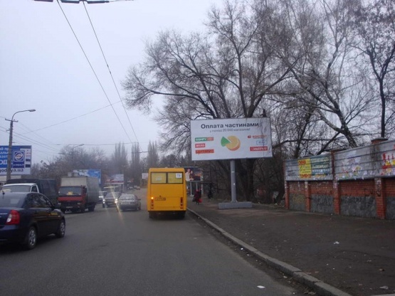 Фото рекламної площини за адресою Нигояна Сергея просп. (Калинина ул.) - Леваневского ул., (500м. к ст.м. Вокзальная, Парк им. Калинина, "Курчатовский рынок", Армянская церковь), в направл. просп. Пушкина