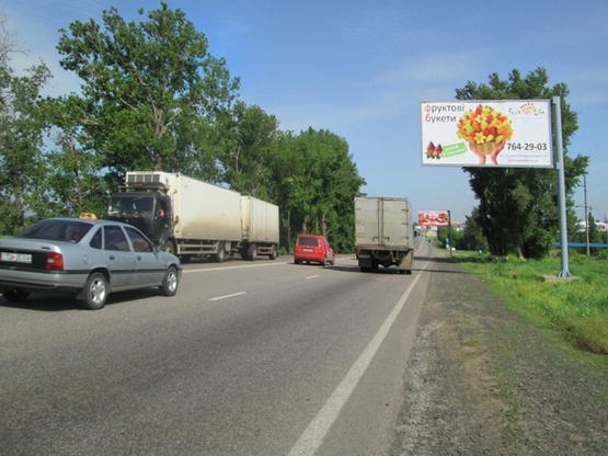 Фото рекламної площини за адресою Гагарина просп./Окружная дорога (с.Коммунар), (АЗС "БРОМ", гипермаркет "Эпицентр"), в направл. в города, аэропорта