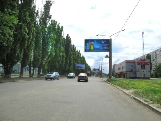 Фото рекламной плоскости по адресу Павлова Ак. ул., 319, (Бильярдный клуб, ТЦ "Космос", магазин "Велопланета", 500м. к ст. м. Студенческая, УкрГазБанк), направл. Московского просп.