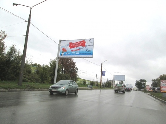 Фото рекламной плоскости по адресу Павлова Ак. ул., 120/6, (АЗС "Shell", маркет "ЕРА", Трактирь "Артель", СТО, Автотехцентр, дом электроники "Target"), направл. Окружной дороги