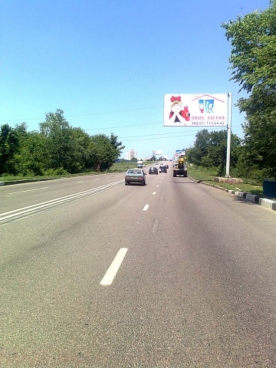 Фото рекламной плоскости по адресу Гагарина просп., напротив №352, (гипермаркет "Эпицентр", "Безлюдовский мясокомбинат", АЗС "БРОМ", въезд в город, к аэропорту