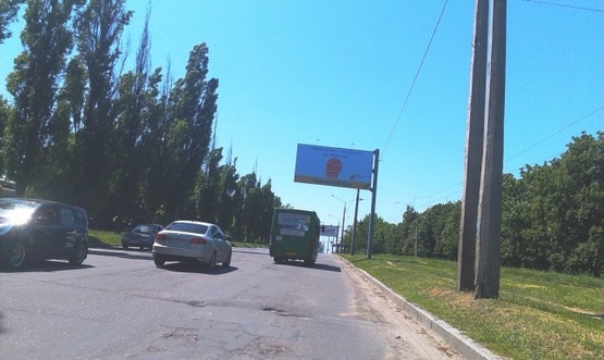 Фото рекламной плоскости по адресу Павлова Ак.ул. - Бестужева ул., (Декор Система, шиномонтаж, парк Памяти, Электронмаш), в направлении ТРЦ"Французский бульвар", Московского просп.
