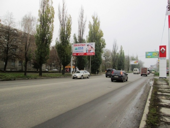 Фото рекламної площини за адресою Клочковская ул. - Тобольская ул., (Автомойка "Кузовной центр", “АК АВТО-ЛАКЦЕНТР”, Школьный Сад), направл. в город
