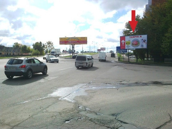 Фото рекламной плоскости по адресу Красной Калины просп., - Угорская ул., 14, (БЦ "Доминант-Плаза", АЗС "ANP", "Метал Холдинг", Интеграл-Банк, "СпецТехника"), направл. из центра